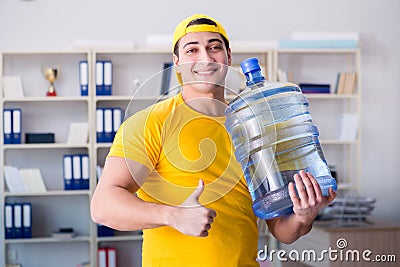 The man delivering water bottle to the office Stock Photo