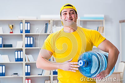 The man delivering water bottle to the office Stock Photo