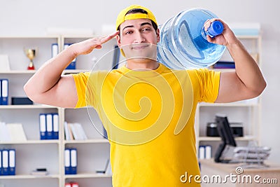 The man delivering water bottle to the office Stock Photo