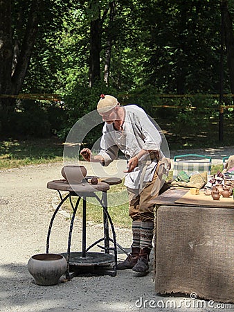 A man demonstrating old potter crafts Editorial Stock Photo