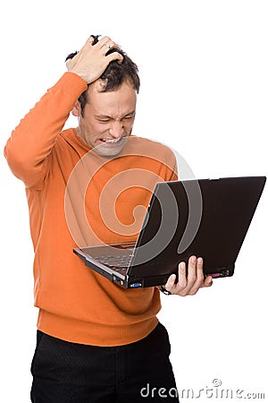 Man despairing with computer Stock Photo