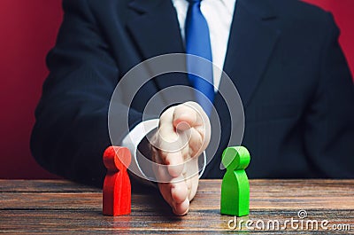 Man divides warring parties conflict with a hand. Mediator services. Stop fight, ceasefire clashes, hot phase of war Stock Photo