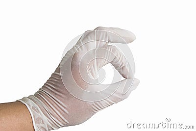 Man doctor pulling on white surgical gloves. Stock Photo