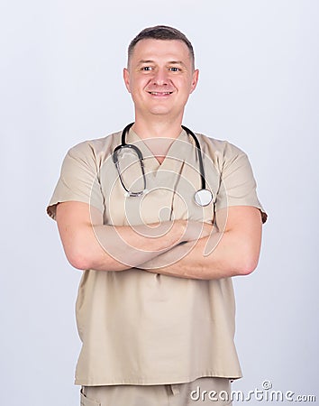 Man doctor with stethoscope physician uniform. Medicine and health care. Professional doctor. Experienced doctor beige Stock Photo