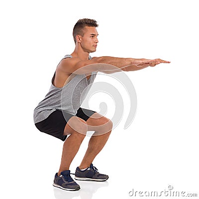 Man Does Squat Stock Photo