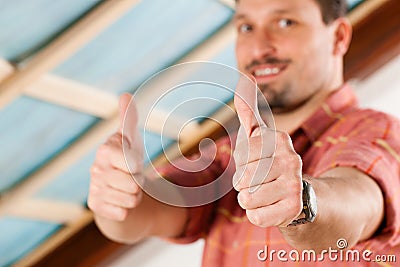 Man doing dry walling, working Stock Photo