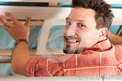 Man doing dry walling, working Stock Photo