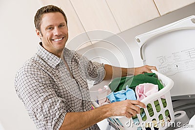 Man Doing Laundry Stock Photo