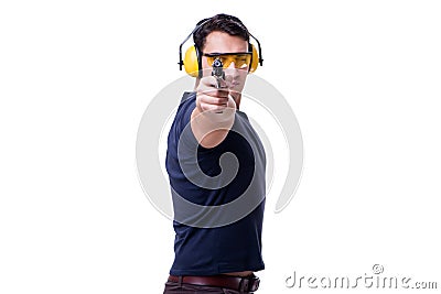 The man doing sport shooting from gun isolated on white Stock Photo