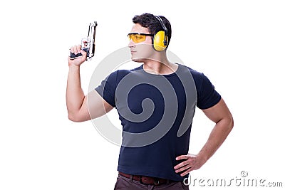 The man doing sport shooting from gun isolated on white Stock Photo