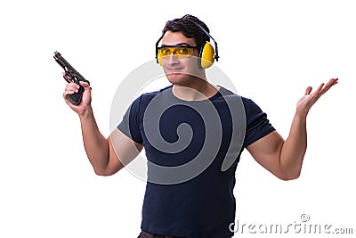 The man doing sport shooting from gun isolated on white Stock Photo