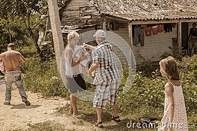 Man donate a cloth and other different things to local cuban village people Editorial Stock Photo