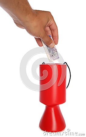 Man donating twenty pounds to charity Stock Photo