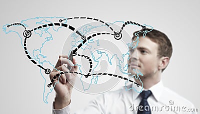 Man drawing a global network on world map Stock Photo