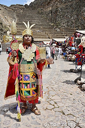 Man dressed as an Inca warrier at the Ollantaytambo Sanctuary Inca Site. Ollantaytambo, Peru, October 5, 2023. Editorial Stock Photo