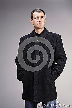 Man dressed in black wool coat Stock Photo