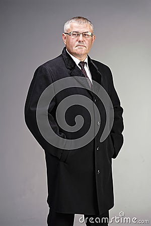 Man dressed in black wool coat Stock Photo