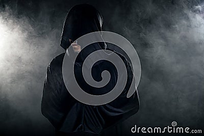 Cult Leader in a Black Robe Stock Photo