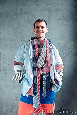 Man dressed in many clothes Stock Photo