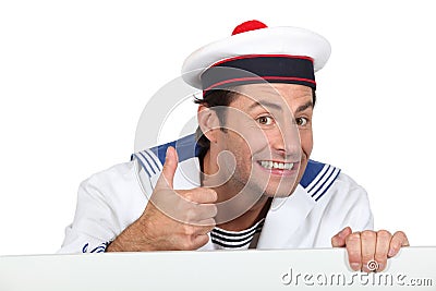 Man dressed in sailor costume Stock Photo