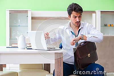 The man dressing up and late for work Stock Photo