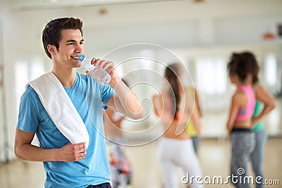 Man drink water after training Stock Photo