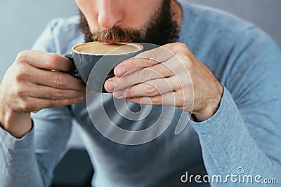 Man drink coffee traditional hot cappuccino mug Stock Photo