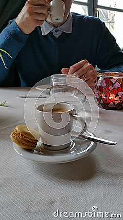 Man drinking expresso coffee in restaurant Stock Photo
