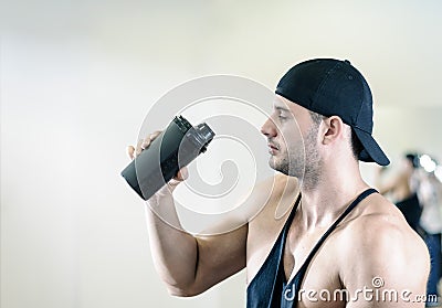 Man drinking shake in gym Stock Photo