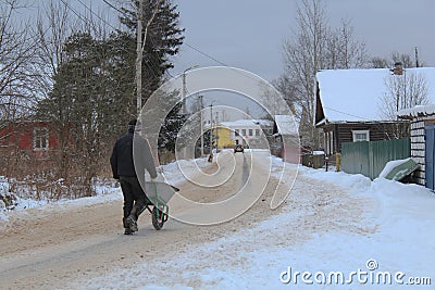 Man drives a car on the way. He rides water to drink. Stock Photo