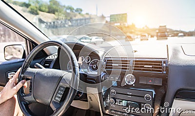 Man driving the car on the freeway Stock Photo