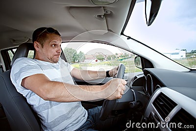 Man driving car , speeding fast. Stock Photo