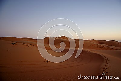 Man at dusk in the desert Editorial Stock Photo