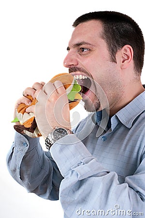 Man eating a giant hamburger Stock Photo