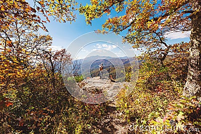 Man at the edge of a cliff Stock Photo