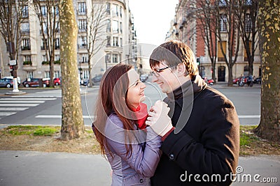 Man embraces woman. loving couple on a walk in setting sun. romantic journey Stock Photo