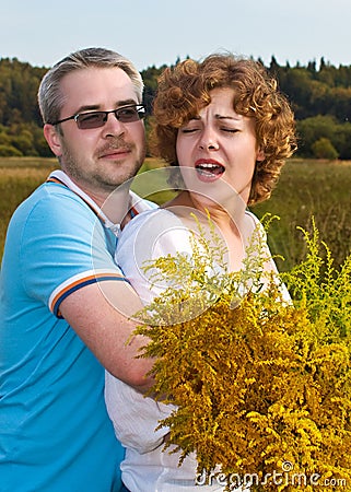 Man embraces woman Stock Photo