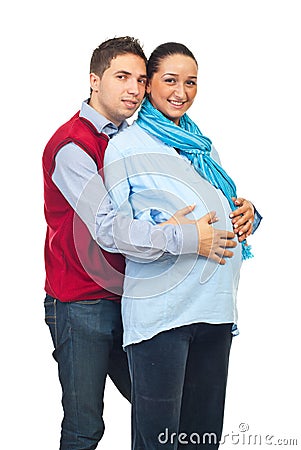 Man embracing his pregnant wife Stock Photo