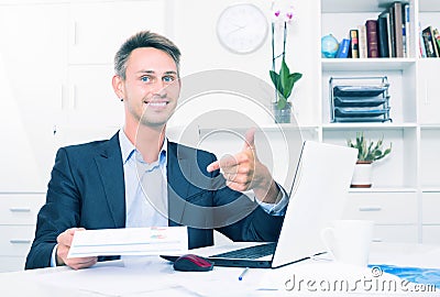 Man employee holding blank document Stock Photo