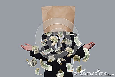 Man with empty bag on head with money rain on grey background Stock Photo