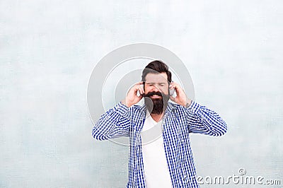 Man enjoy favorite song. music is my life. hipster man wear headphones. inspired by quality of sound. listen play list Stock Photo