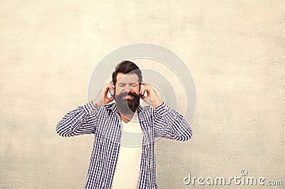 Man enjoy favorite song. music is my life. hipster man wear headphones. inspired by quality of sound. listen play list Stock Photo