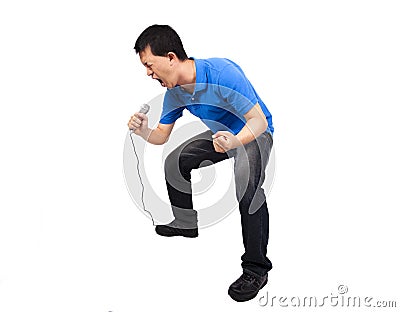 Man enjoy singing and holding microphone Stock Photo