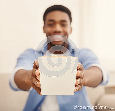 Man enjoying chinese fast food in delivery box Stock Photo