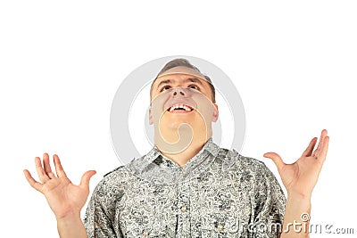 Man in enthusiasm looks upward with hads up Stock Photo