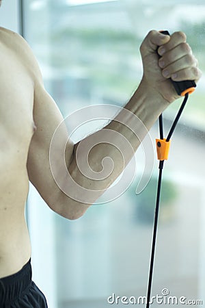 Man exercising with bands Stock Photo