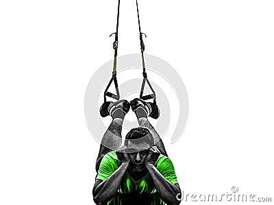 Man exercising suspension training trx tired pouting silhouette Stock Photo