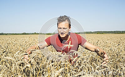 Man farmer in rye field Stock Photo