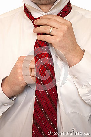 The man fastens a tie Stock Photo