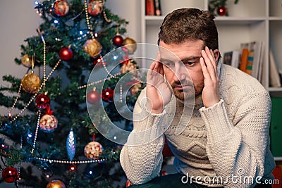 Man felling depressed and lonely during the christmas time Stock Photo